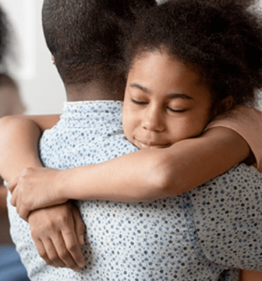  child hugging parent